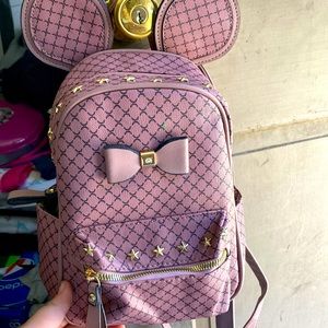 It’s a very cute Disney backpack I bought it when I was at the Disney store